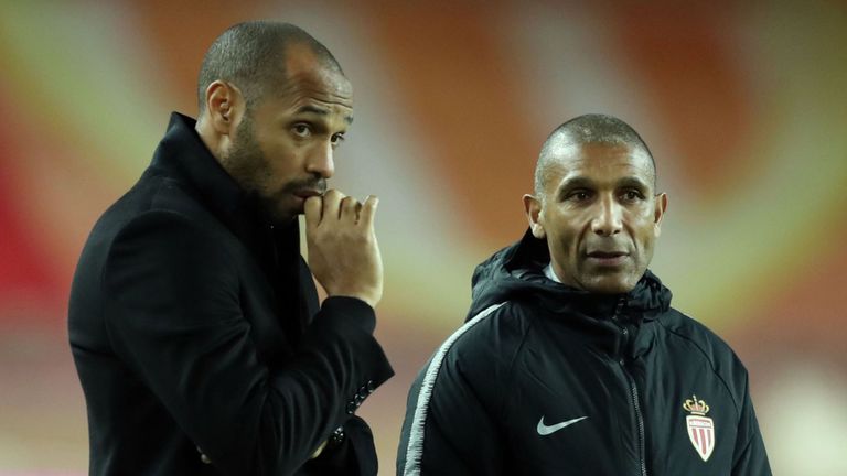 Henry’s assistant Franck Passi (right) will take temporary charge of first-team affairs